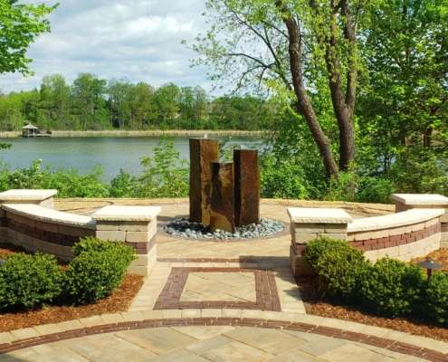 Paved patio with water feature